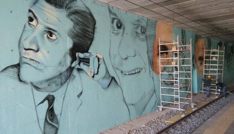 Street art nella stazione Circum: Massimo Troisi e Alighiero Noschese lungo i binari a San Giorgio a Cremano 